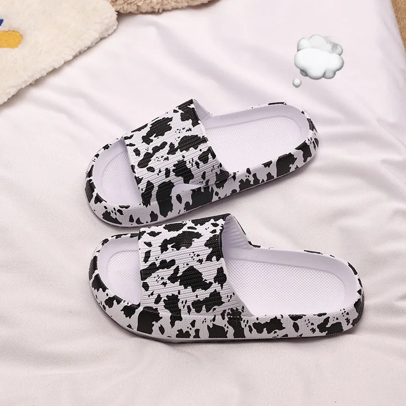 Chinelo Nuvem Oncinha